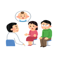 医師と相談する夫婦